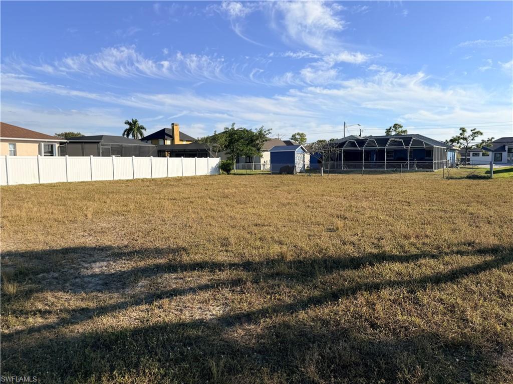 Image 2: View of yard featuring a residential view