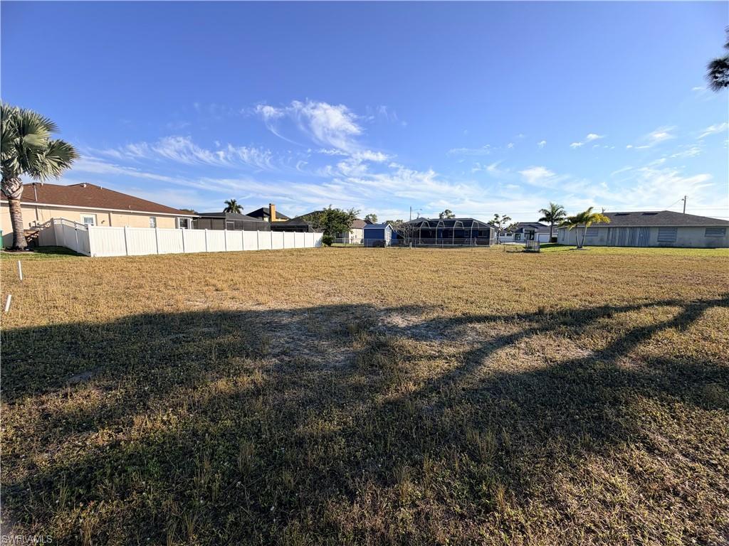 Image 3: View of yard with a residential view