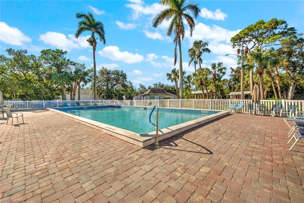 Image 2: View of swimming pool featuring a patio area