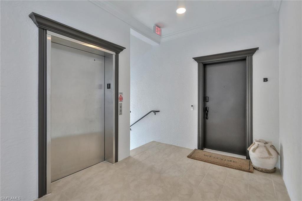 Image 4: Entrance to property featuring elevator