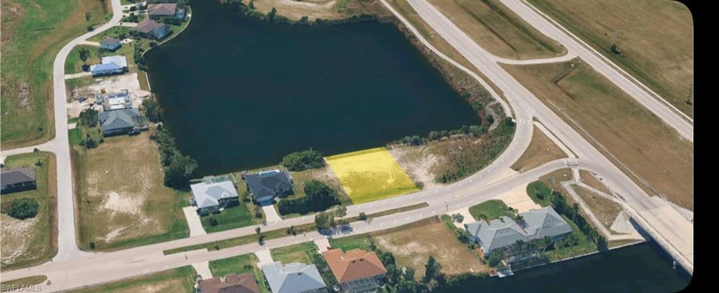 Image 4: Aerial view of property and surrounding area