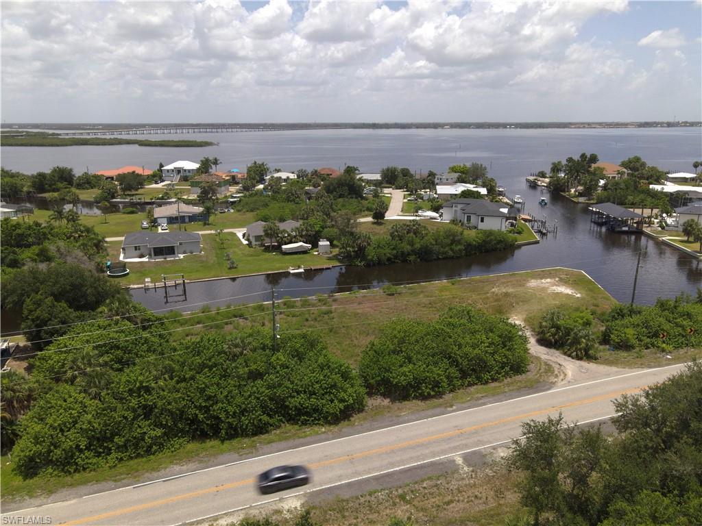 Image 2: Aerial View of Lot with the Peace River beyond the next block