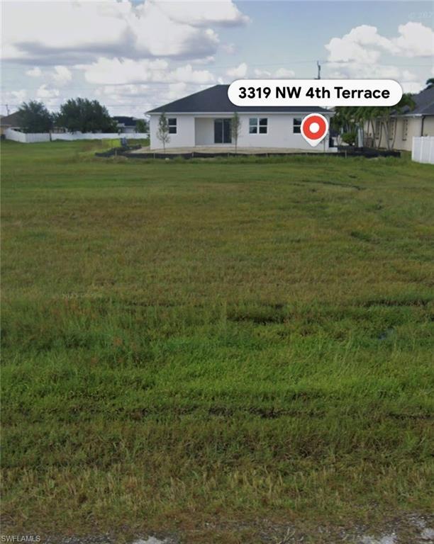 Image 1: View of grassy yard