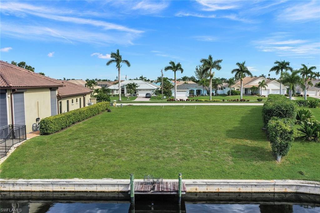 Image 4: View of grassy yard