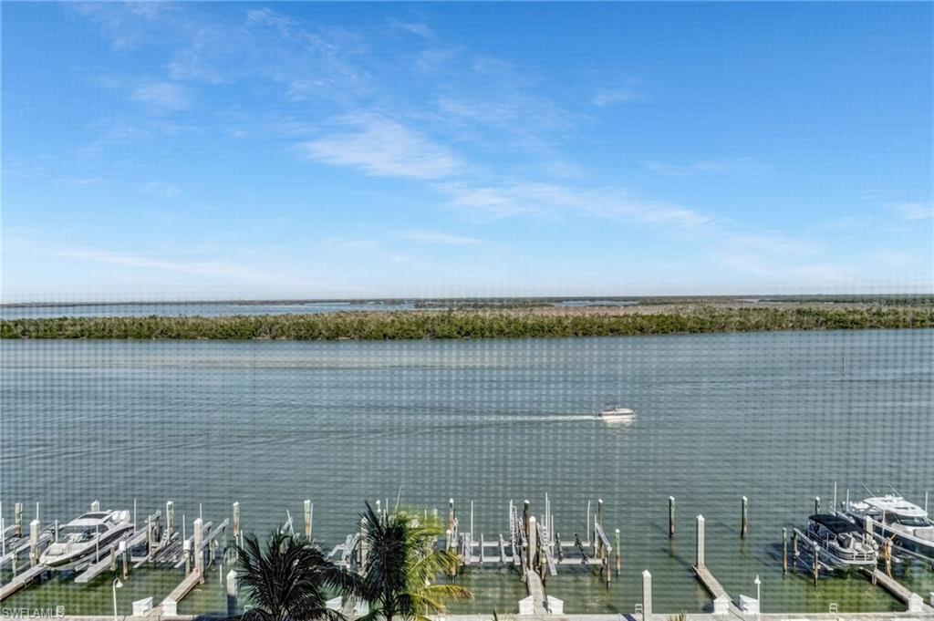 Image 2: Bay view featuring boat docks