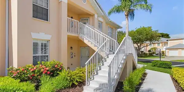 Image 2: View of property with stairs