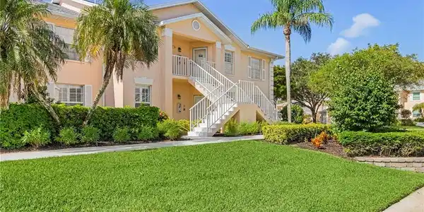 Image 4: View of property featuring stairs