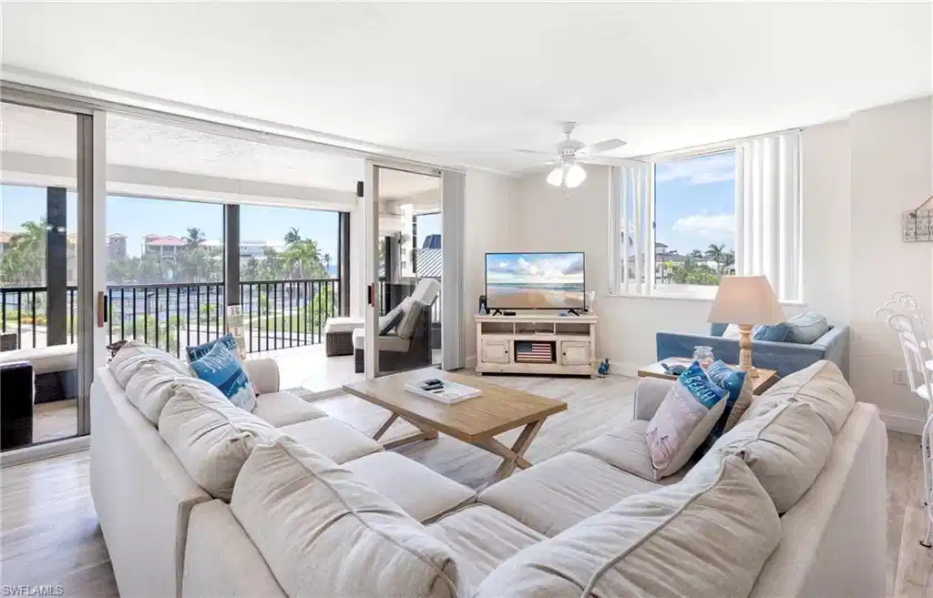 Image 1: Living area with view of amenities area