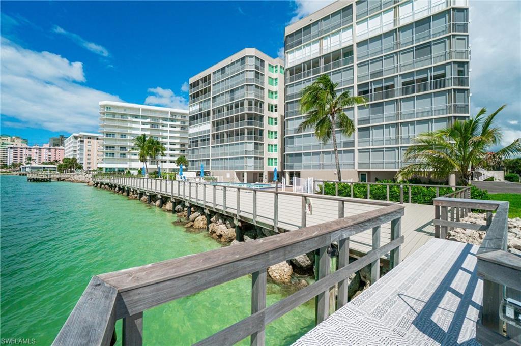 Image 1: The Exclusive private fishing dock at the Mirage stretch over the tranquil Gulf waters.