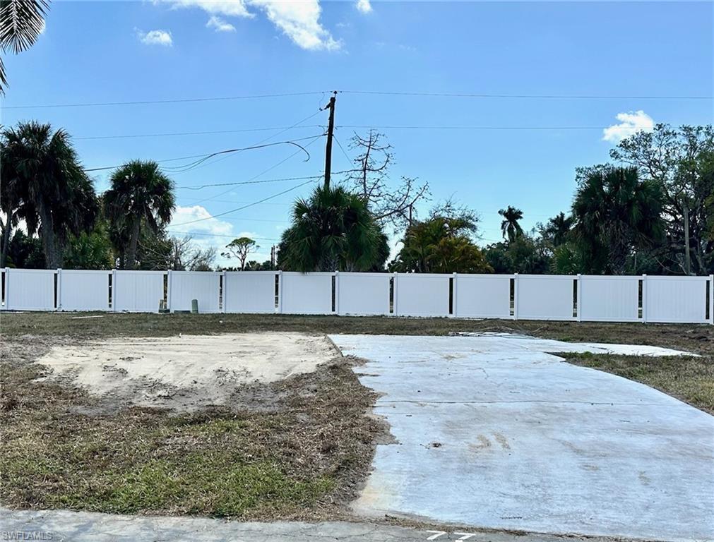 Image 2: Lot is leveled with only the driveway remaining