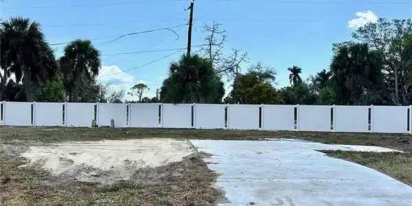 Image 2: Lot is leveled with only the driveway remaining