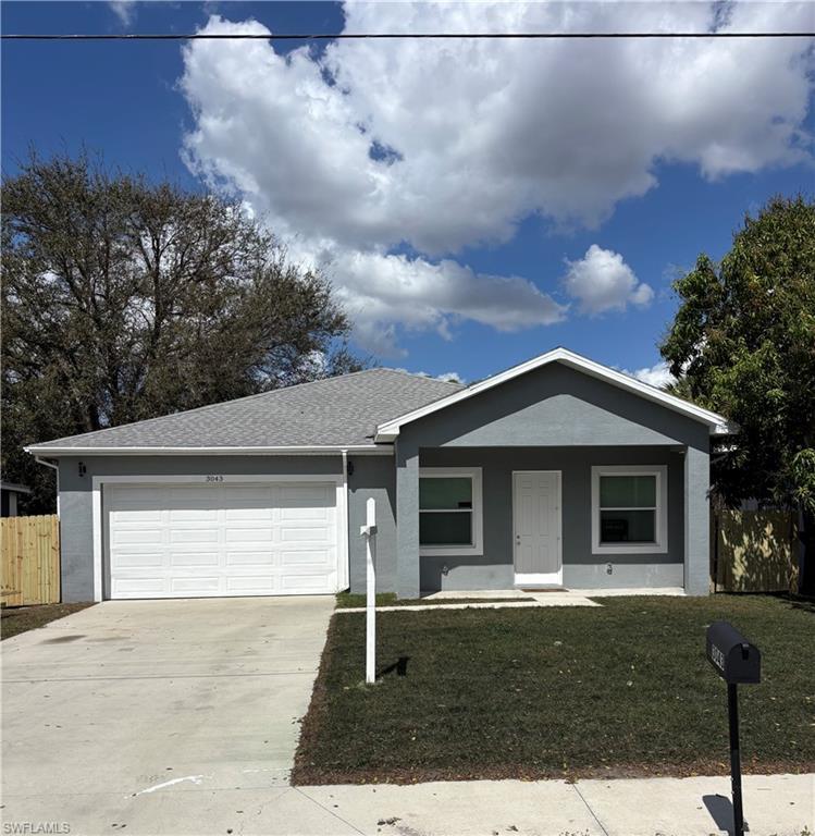 Image 1: Ranch-style house featuring a porch, an attached garage, concrete driveway, stucco siding, and roof with shingles