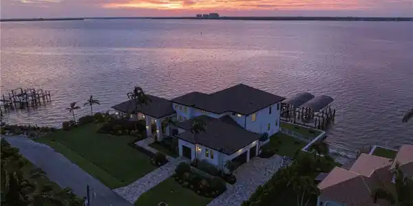 Image 2: A compound unlike any other in Fort Myers, offering an unparalleled level of privacy and seclusion within an extraordinary waterfront setting.
