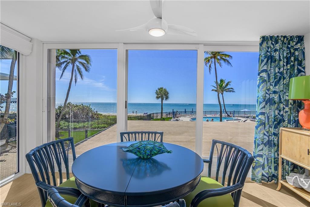 Image 4: Sunroom featuring a Pool and Gulf water view