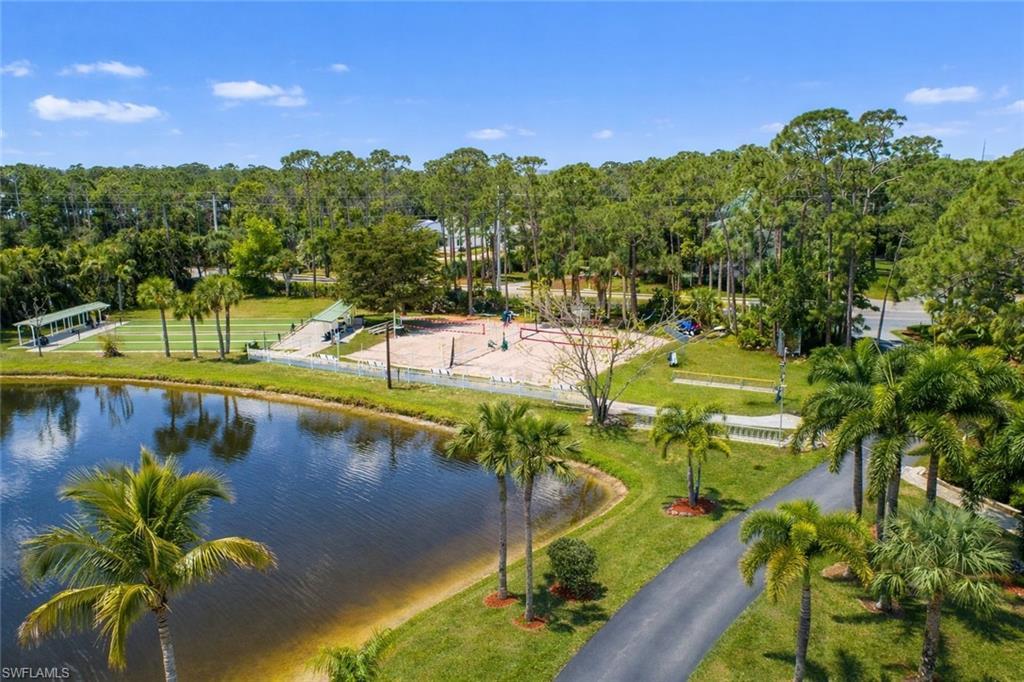Image 3: Bird's eye view of a large body of water and a tree filled landscape