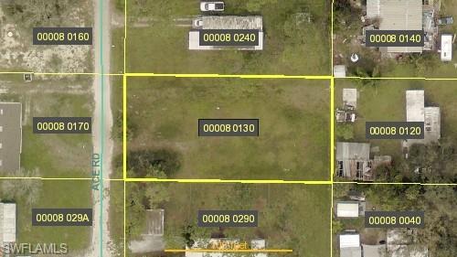 Image 2: Aerial overview of property's location featuring property boundaries highlighted