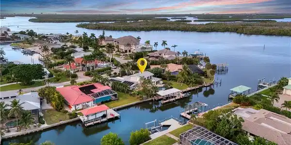 Image 2: Bird's eye view with a water view  -Virtually enhanced image