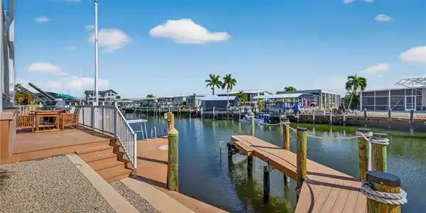 Image 4: Dock area featuring a water view