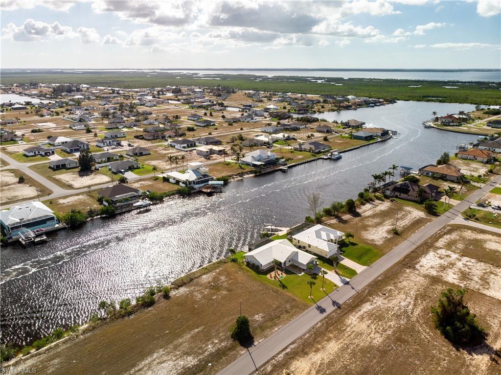 Image 3: Birds eye view of property with a water view