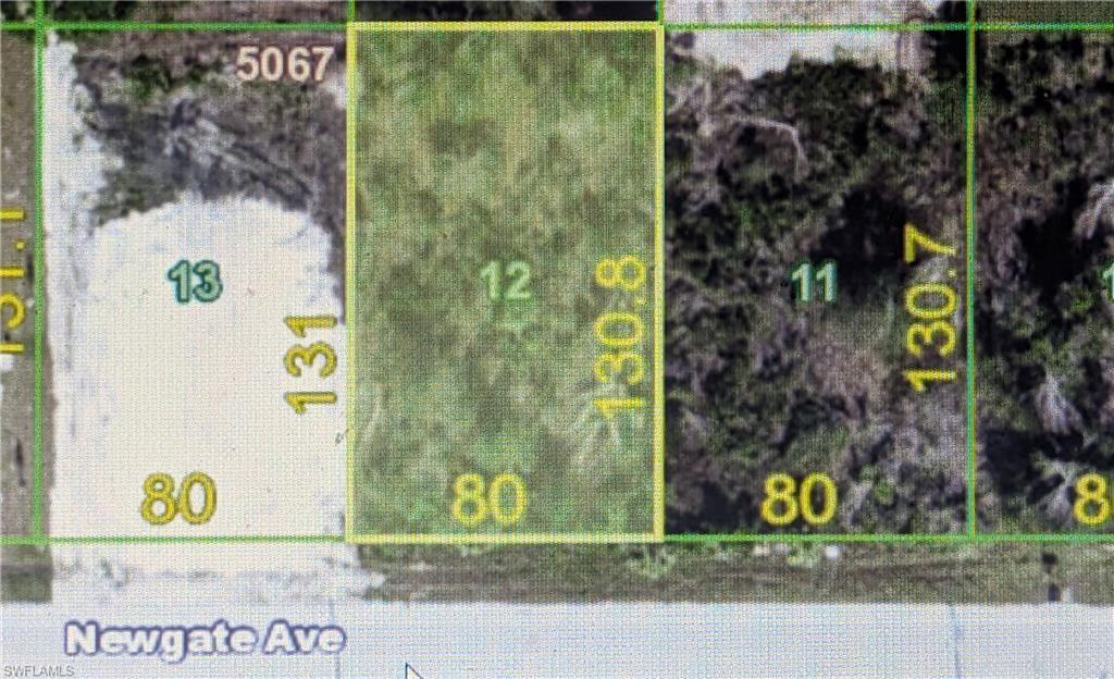 Image 1: Aerial view of property's location featuring property boundaries highlighted