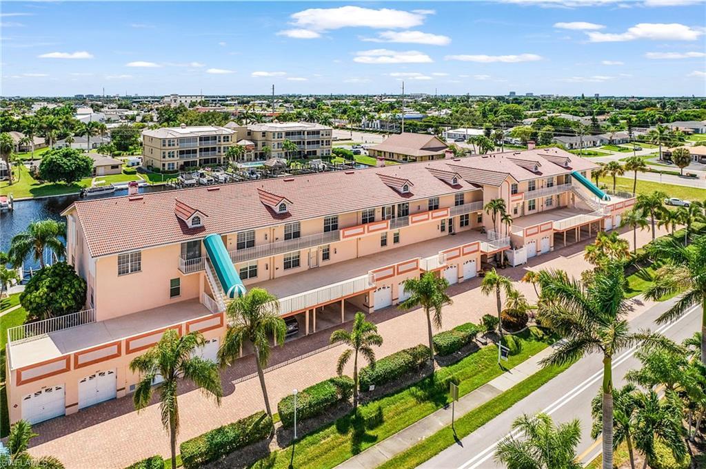 Image 1: Drone / aerial view of apartment complex / building
