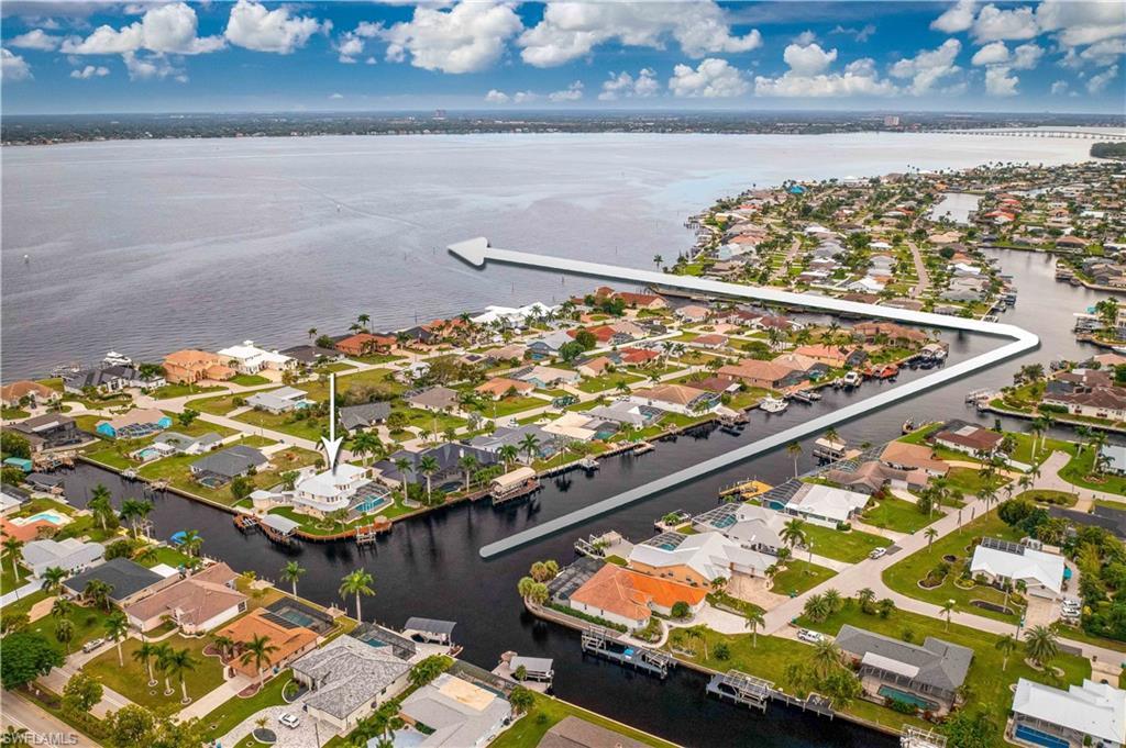 Image 3: Aerial view with a residential view and a water view