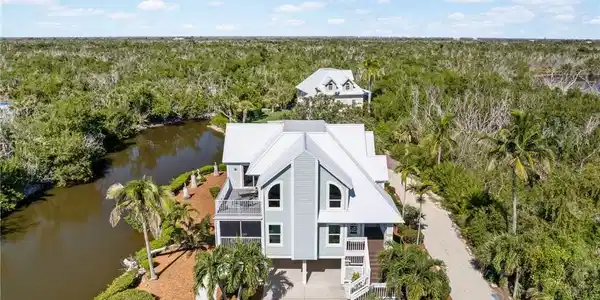 Image 4: Welcome to 241 Violet Drive, a beautifully reimagined coastal retreat on Sanibel Island.