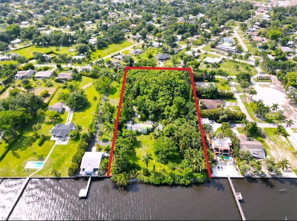 Image 2: Birds eye view of property featuring a water view