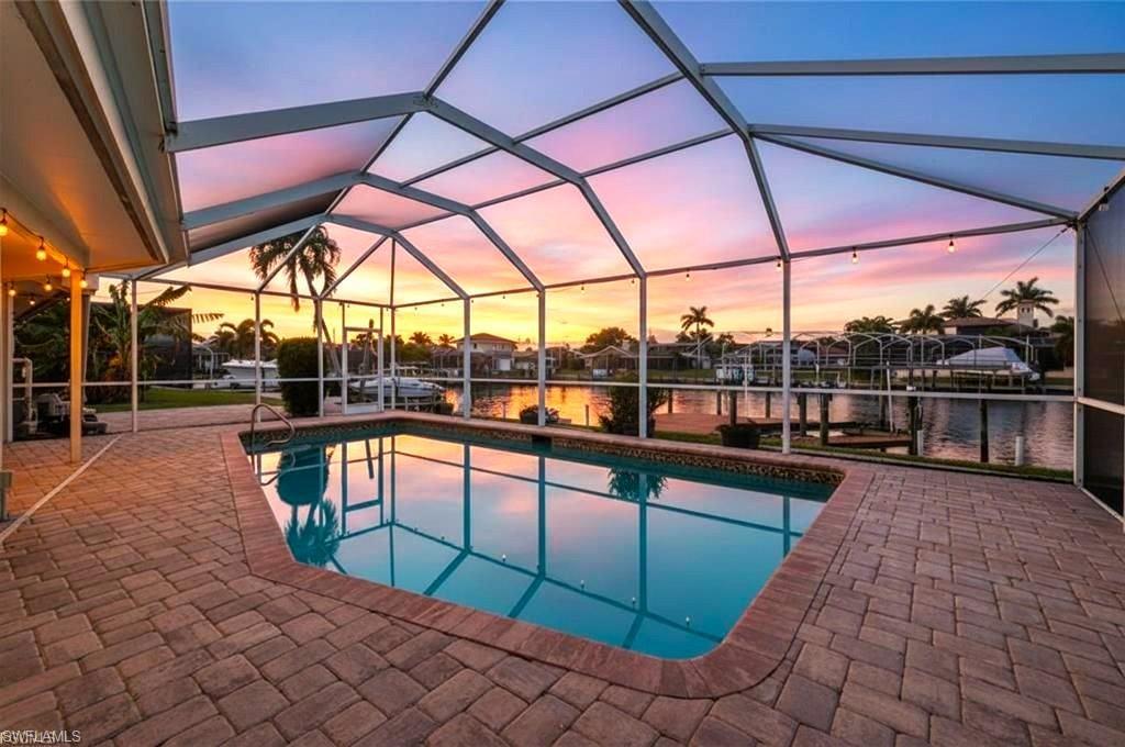 Image 4: Solar Heated Salt Water Pool on Direct Access 200+ ft Canal leading to Calusahatchee River