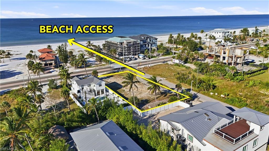 Image 2: View of property location with expansive beach and property boundaries highlighted - Virtually Edited Image