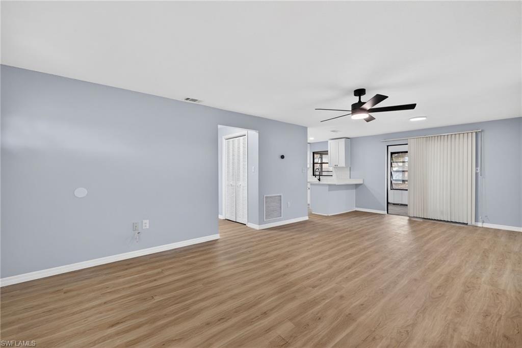 Image 2: Unfurnished living room with ceiling fan, light wood-type flooring, and recessed lighting