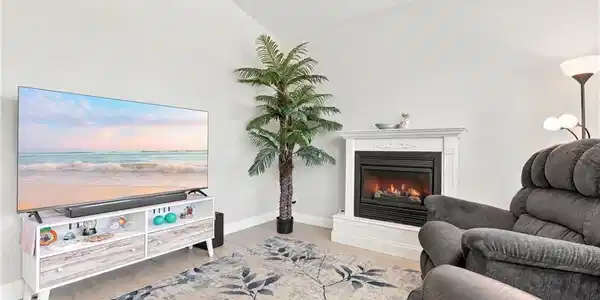 Image 4: Fireplace with a classic white mantel