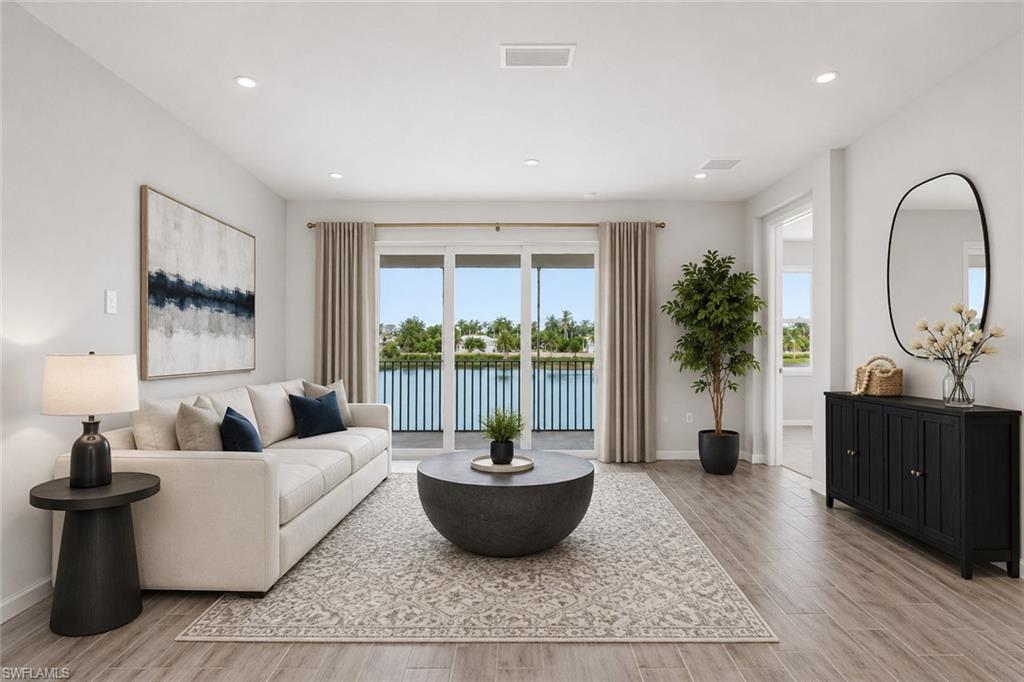 Image 2: Photo includes reality renovation/reality staging to showcase the potential of the living room. Design services included with purchase!