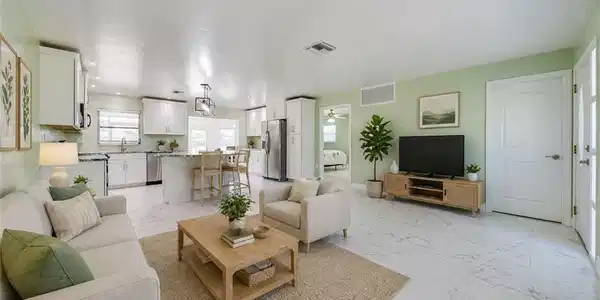 Image 4: Virtually Staged - Great Room with View of Kitchen