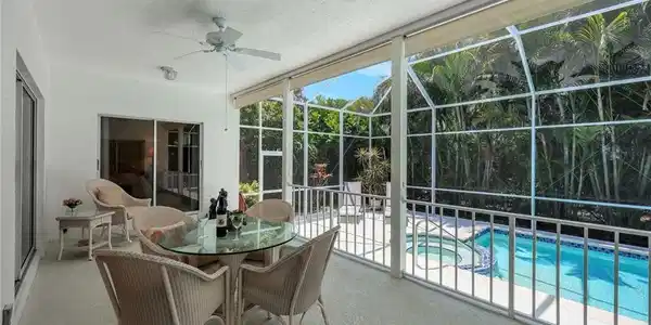 Image 3: Sunroom with a ceiling fan and a jacuzzi