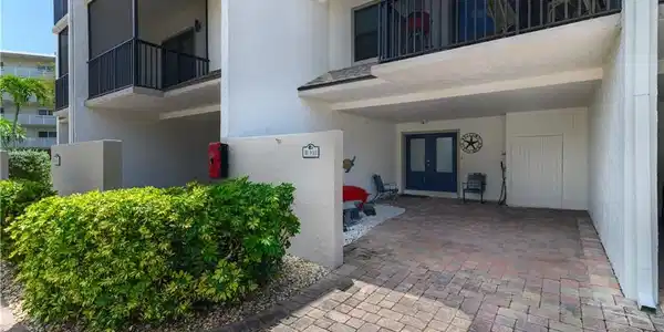 Image 3: COVERED PARKING, STORAGE & ENTRY