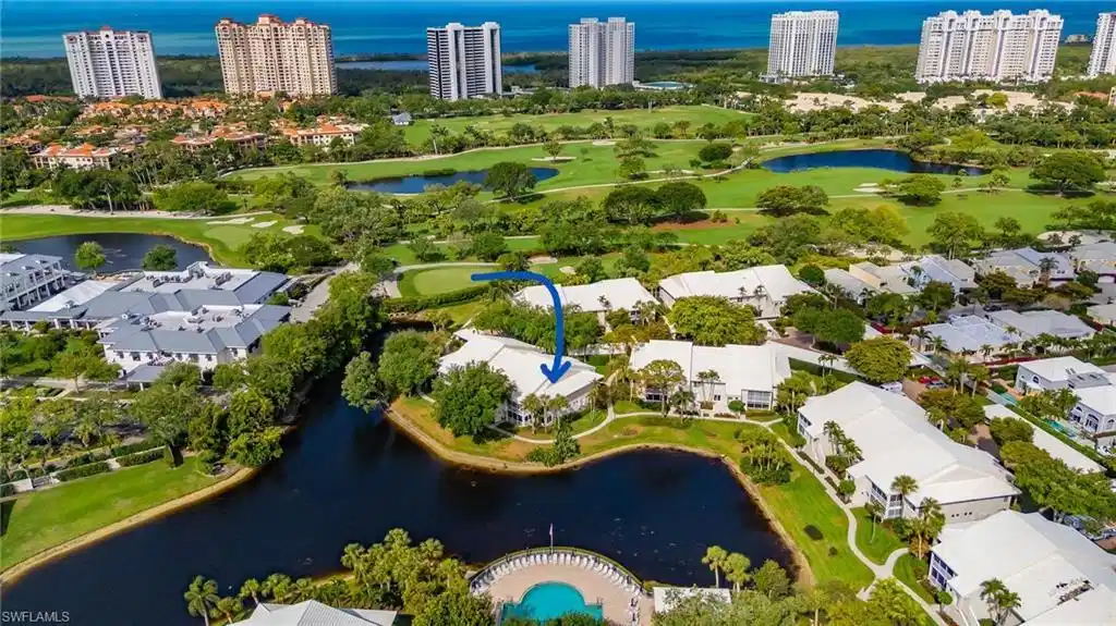 Image 1: Aerial View of Pool and Property