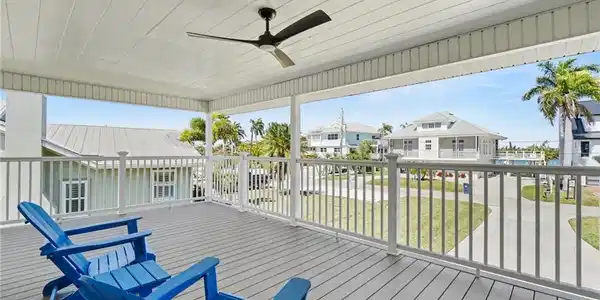 Image 4: Gorgeous view from the new deck. Enjoy the breezes off the water.
