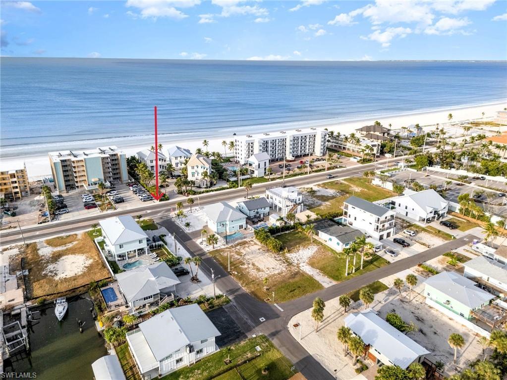 Image 1: Beach access sidewalk across Estero Blvd