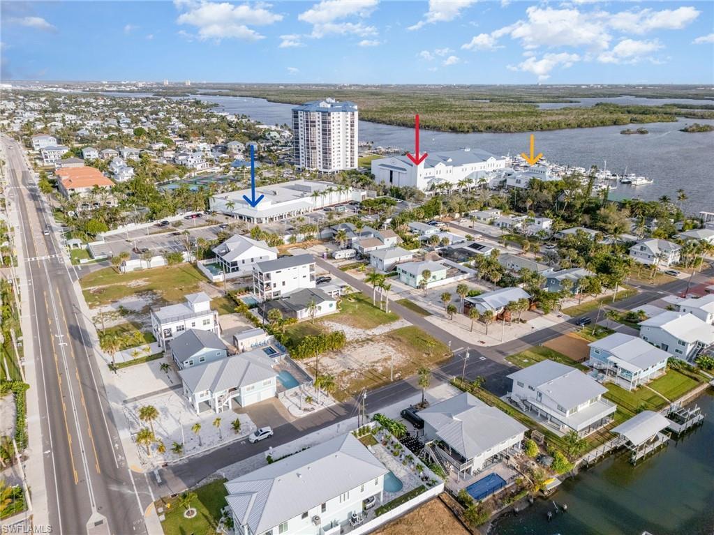 Image 3: Publix (blue arrow), Marina (red arrow), 2 Restaurants (yellow)