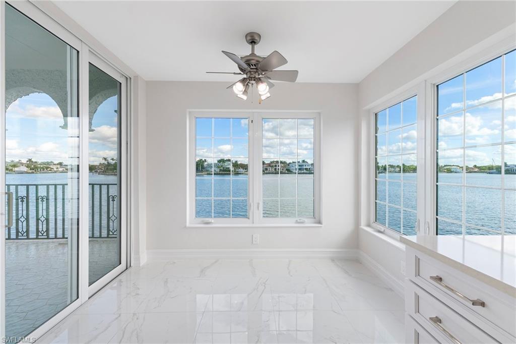 Image 3: Unfurnished sunroom featuring a water view and plenty of natural light