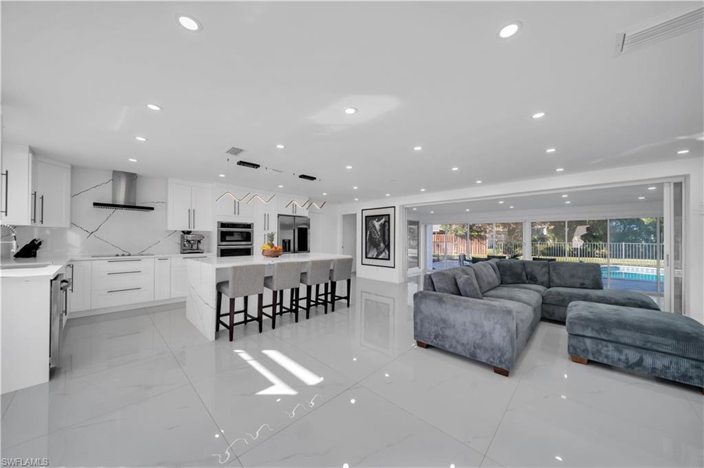 Image 3: Living area with recessed lighting