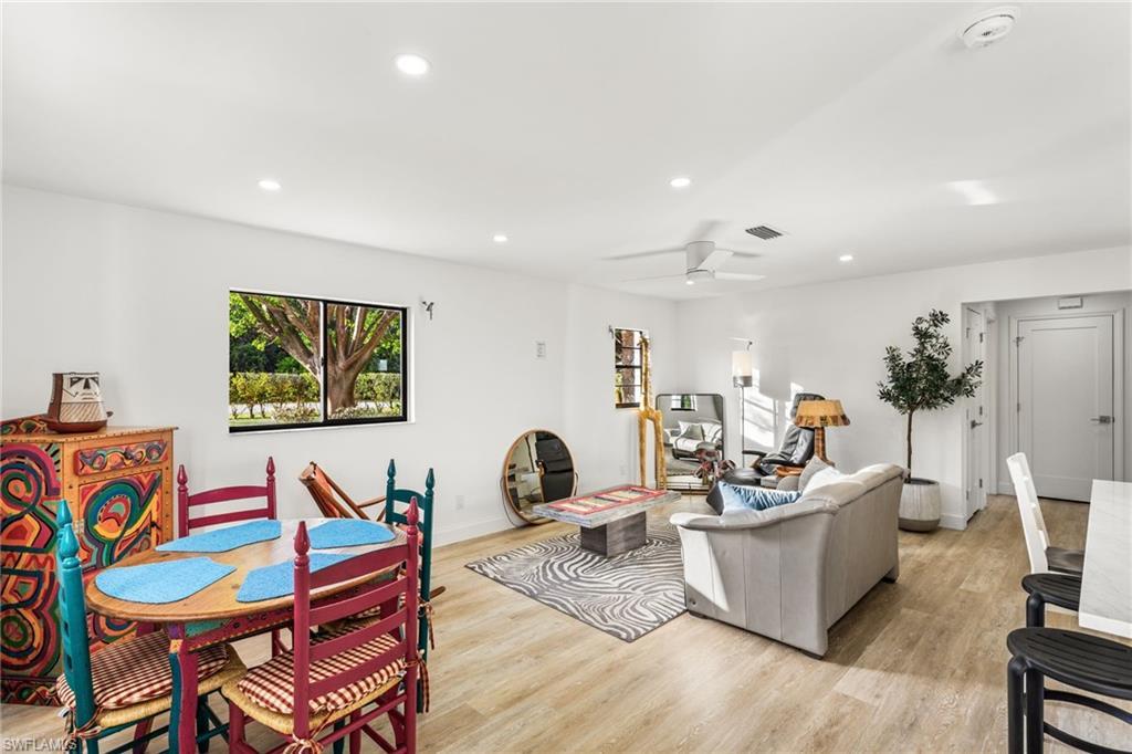 Image 2: Living area with recessed lighting, light wood-type flooring, and a ceiling fan