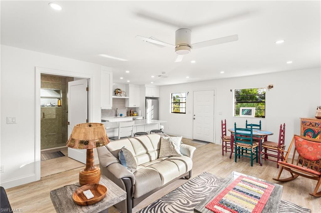 Image 3: Living area featuring recessed lighting, light wood-type flooring, and a ceiling fan