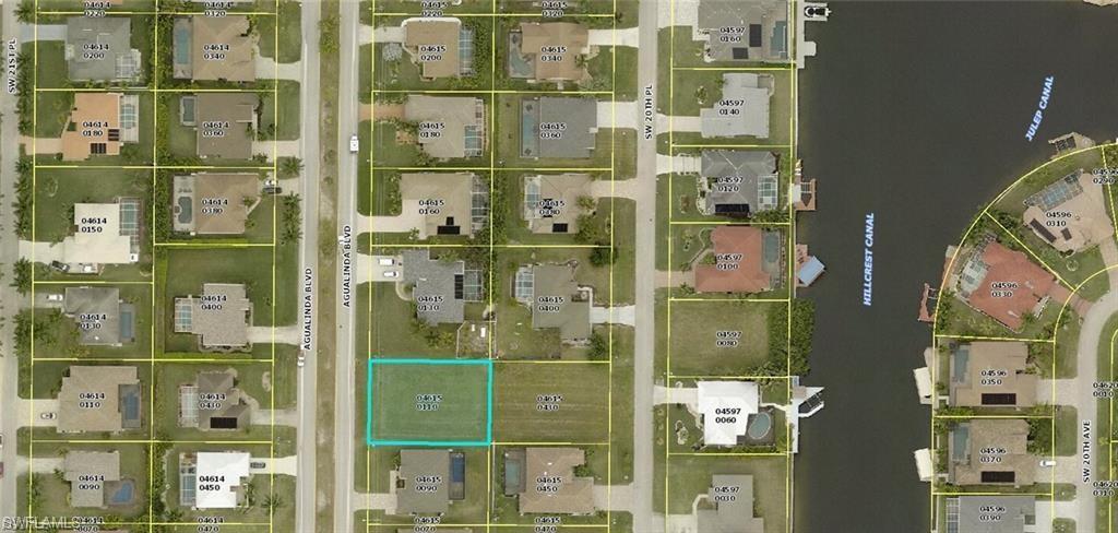 Image 1: Aerial overview of property's location featuring property parcel outlined