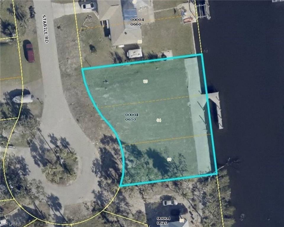 Image 2: Aerial overview of property's location with property boundaries highlighted