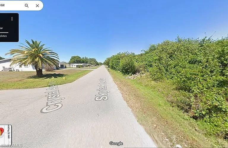 Image 2: View of asphalt road
