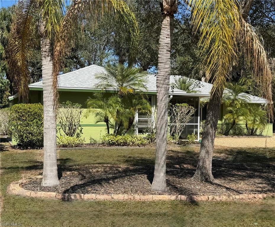 Image 3: Front Facade with enhanced landscaping