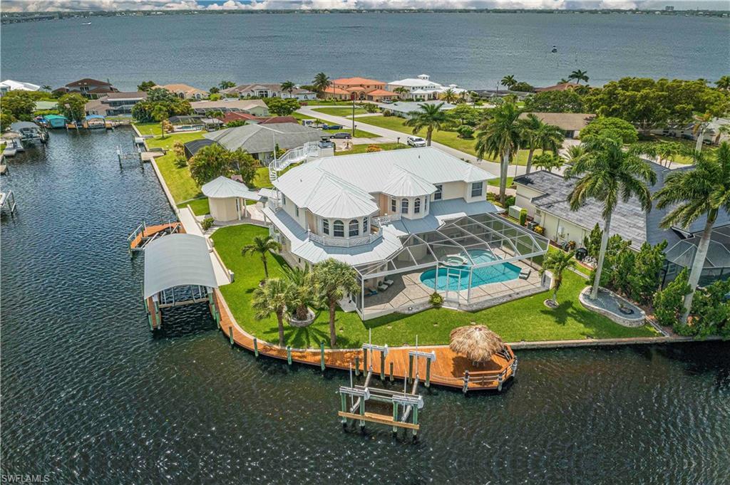 Image 4: Birds eye view of property featuring a residential view and a water view
