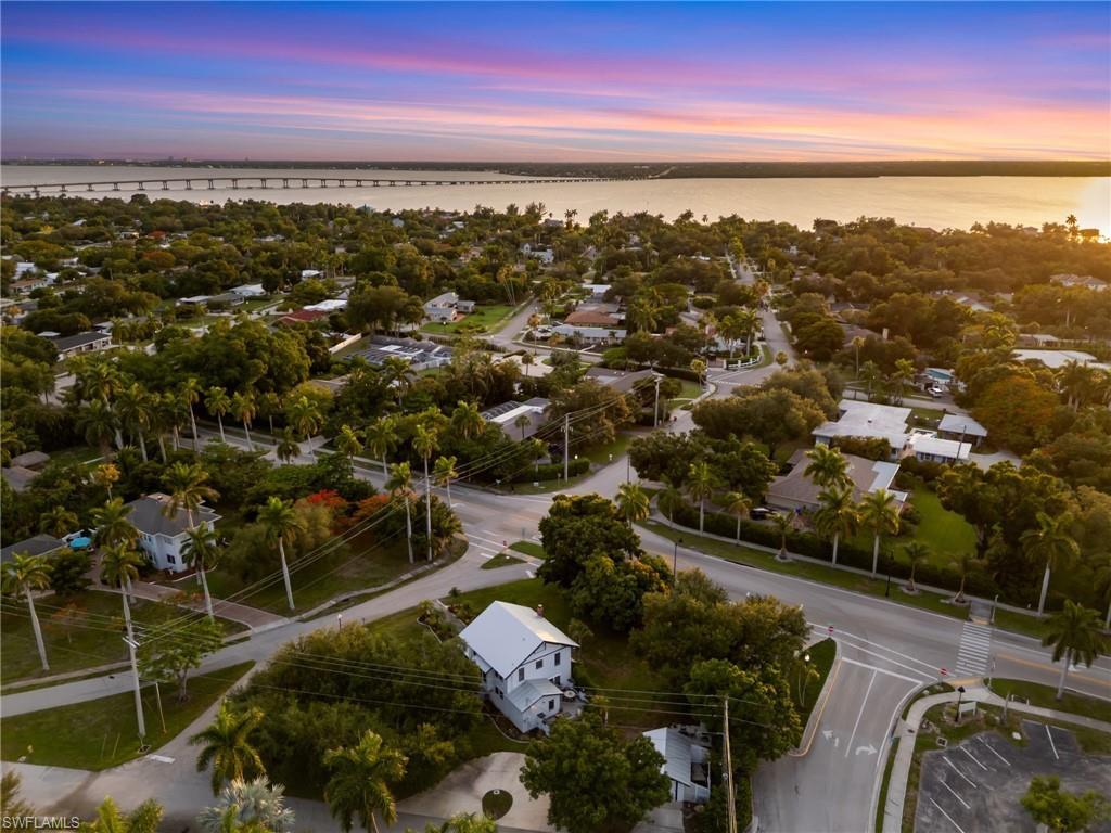 Image 2: Located just moments from the Caloosahatchee River and outside the flood zone, this property offers both historic charm and peace of mind.